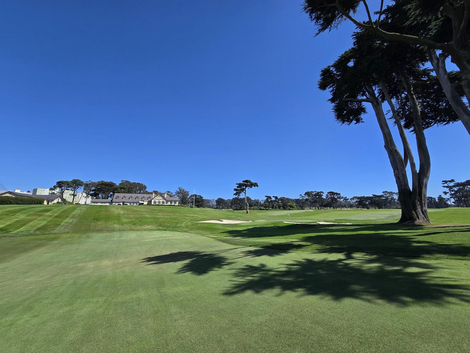 San Francisco Golf Club, cypress framed fairway and classic Tillinghast bunkering in San Francisco