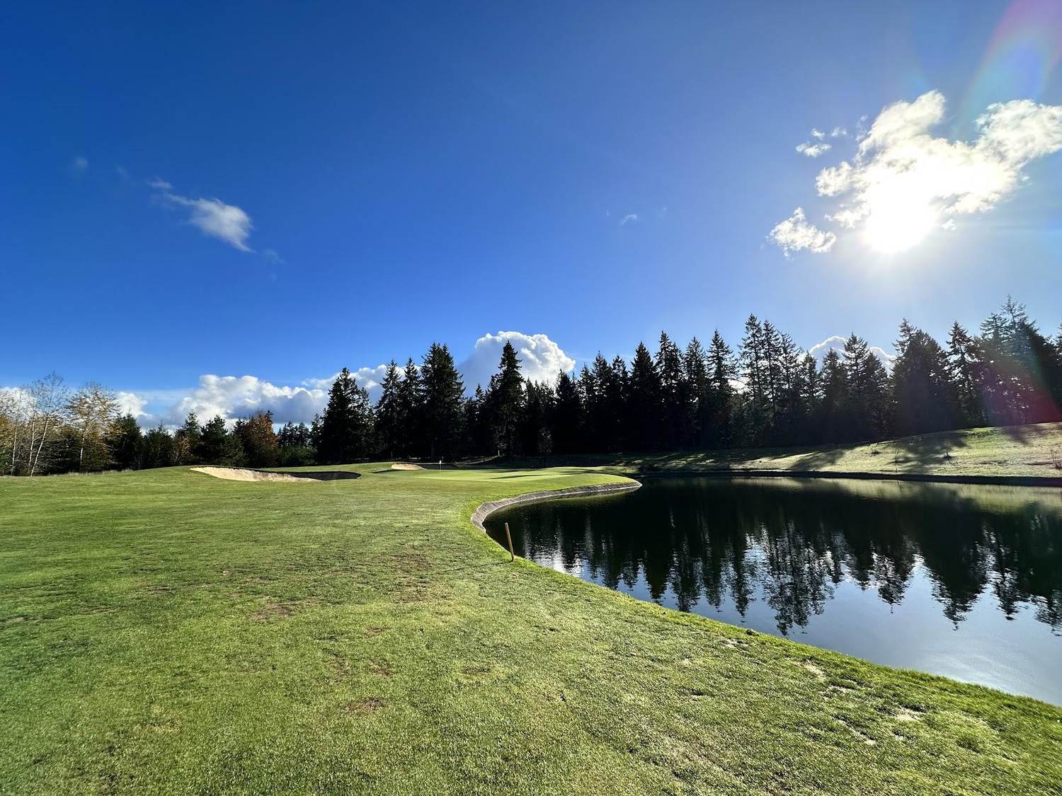 The Home Course, open links style fairway with Puget Sound beyond at DuPont, Washington