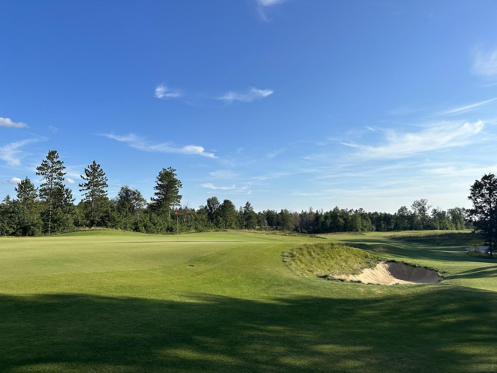 The Loop at Forest Dunes, open reversible fairways framed by sand and grass at Roscommon, Michigan