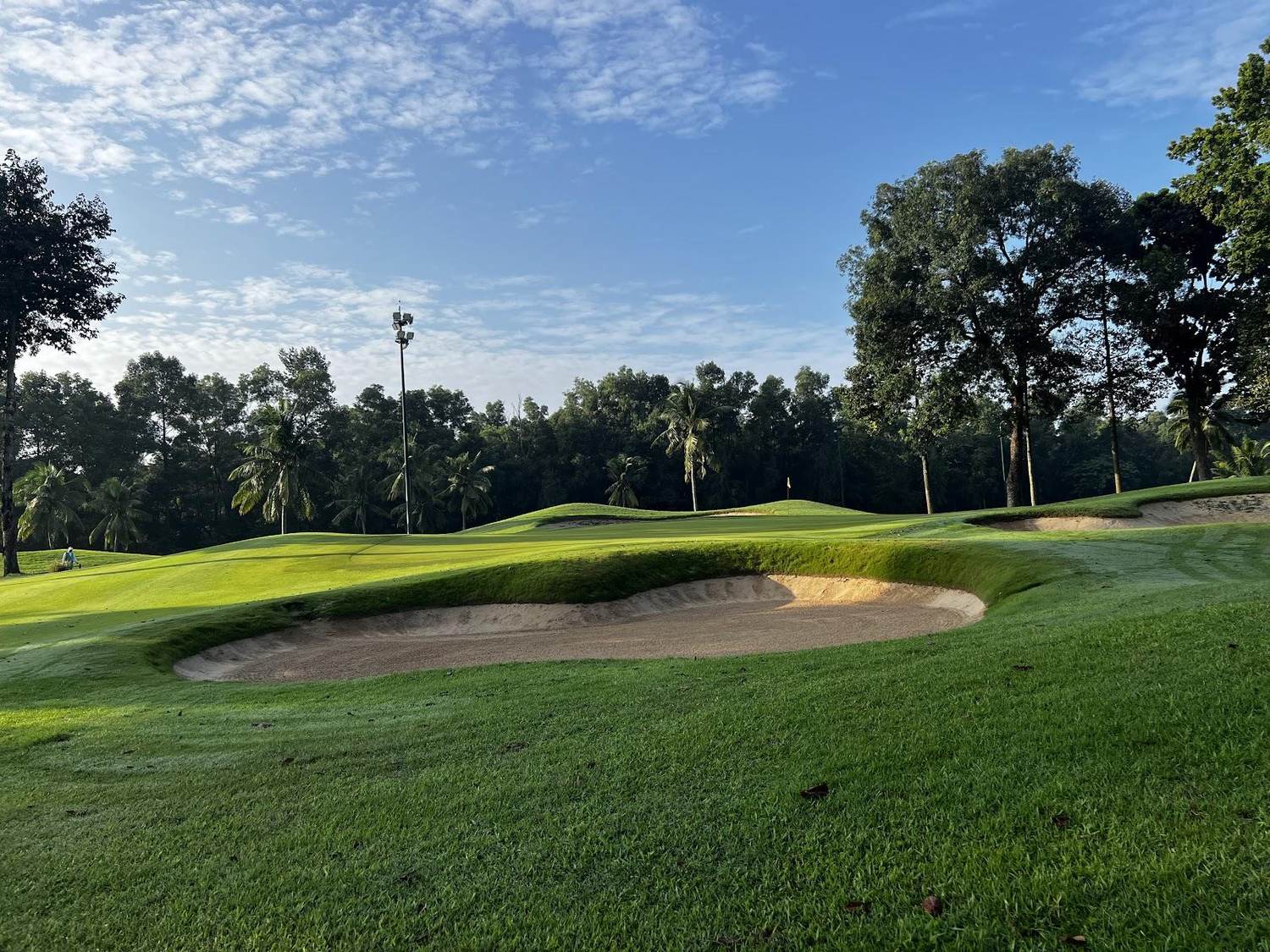Vietnam Golf and Country Club, parkland fairway and lake near Ho Chi Minh City, Vietnam