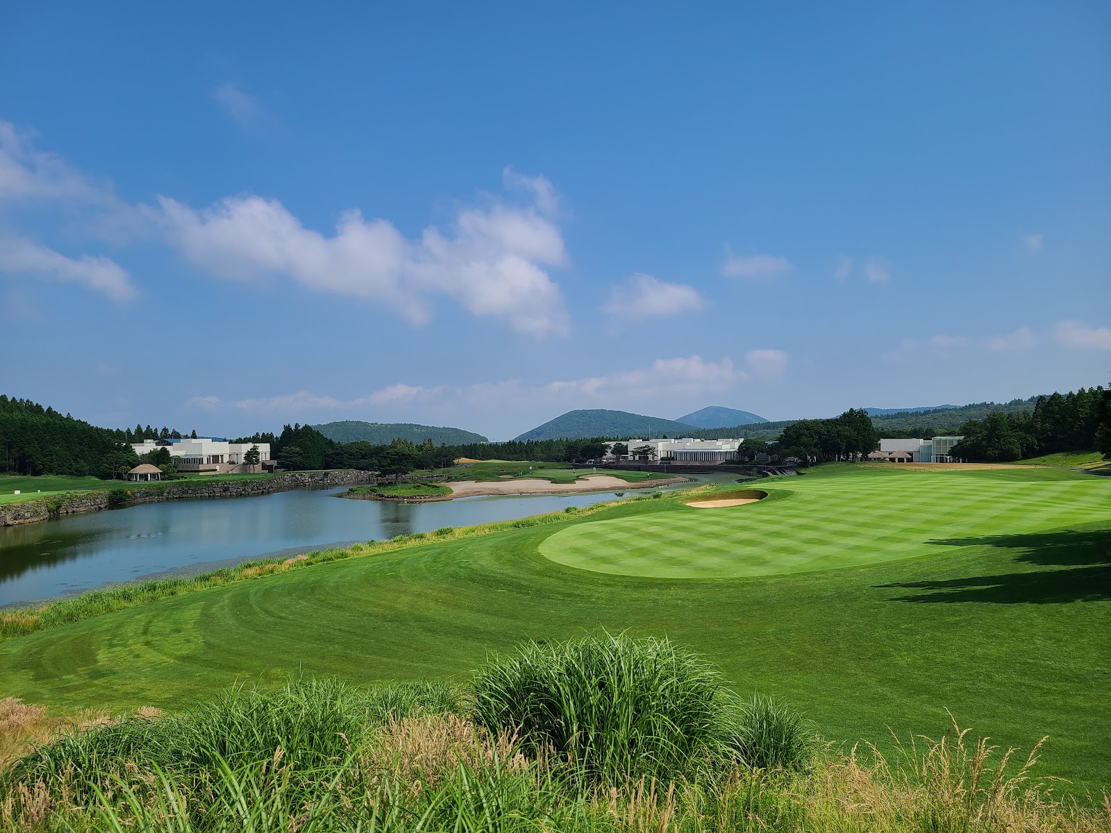The Club at Nine Bridges on Jeju Island, fairways framed by volcanic stone and Mount Halla