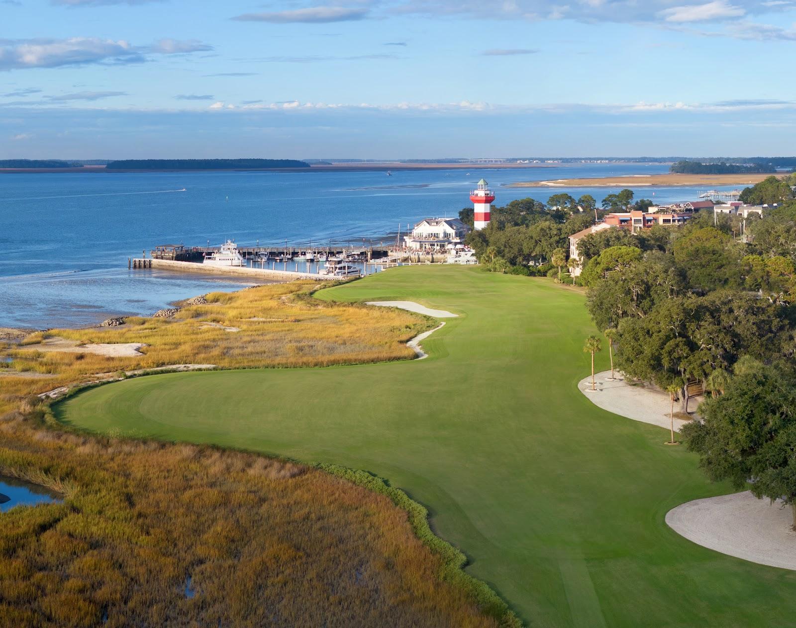 Harbour Town Golf Links 18th hole along Calibogue Sound with the red and white lighthouse, Hilton Head Island, South Carolina