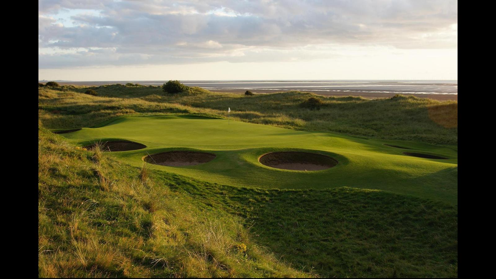 Silloth on Solway Golf Club, Cumbria, links green and bunkers above the Solway Firth