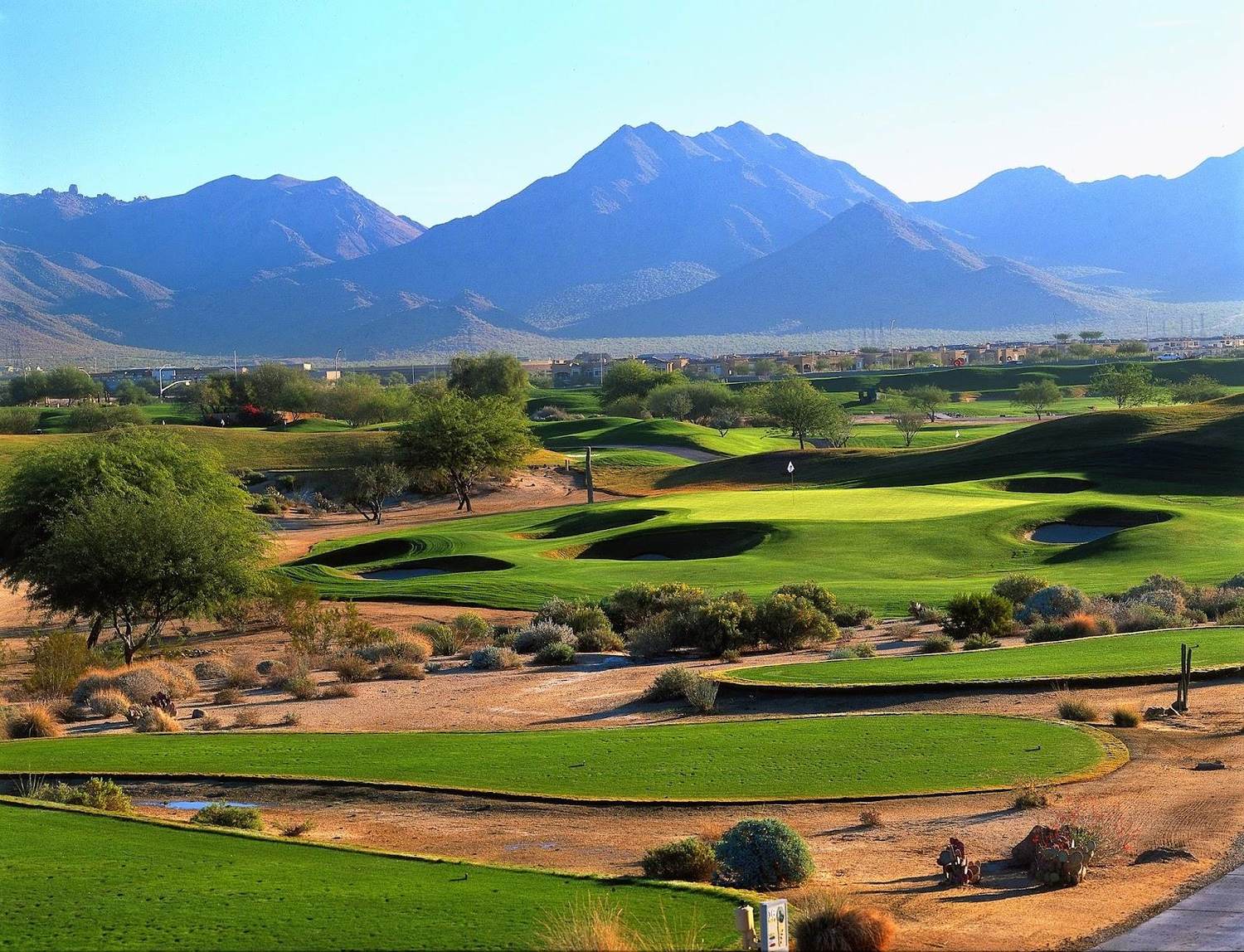 TPC Scottsdale Stadium Course fairways framed by Sonoran desert and the McDowell Mountains, Arizona