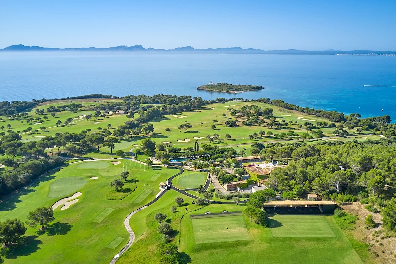 Club de Golf Alcanada on the north coast of Mallorca with its lighthouse island, Spain