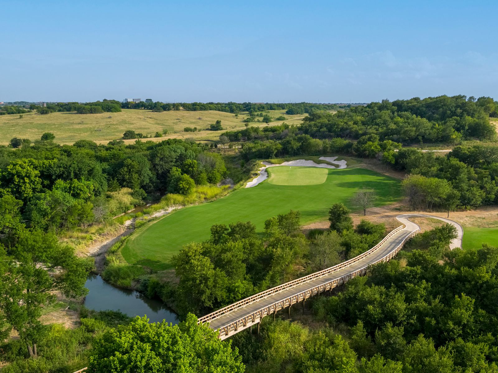Fields Ranch at PGA Frisco, rolling North Texas terrain and native grasses framing the fairways